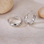 Stainless steel mini hoop earrings - Image 2